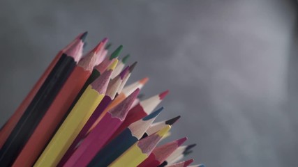Aufkleber - Colored pencils, rotation 360 degrees. Dark bacground. Macro view.