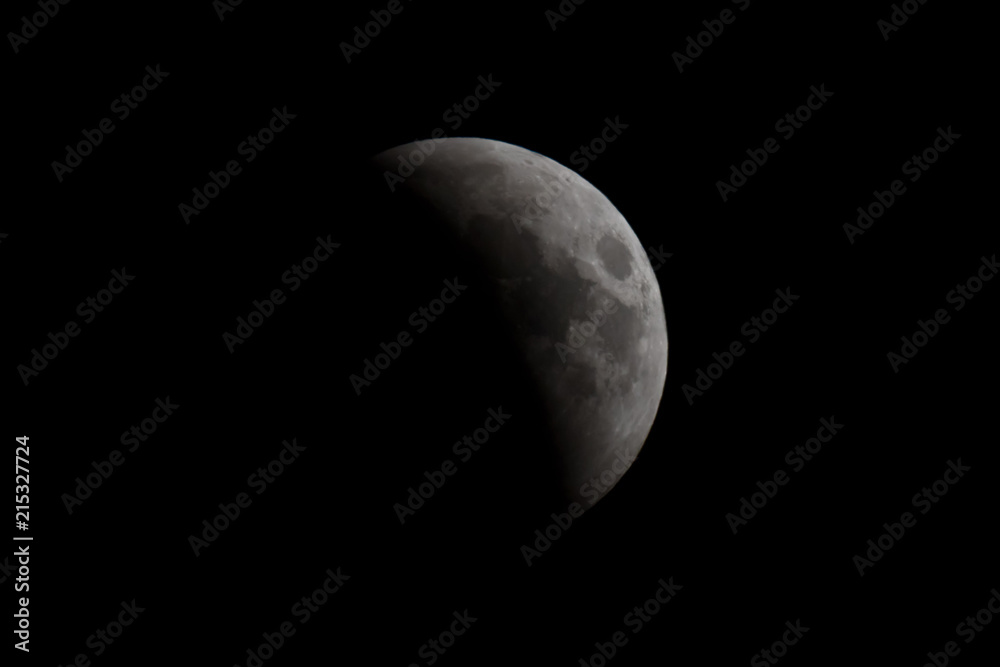 Lunar Eclipse: the phase of the moon obscured by the shadow of the planet Earth - obrazy, fototapety, plakaty 