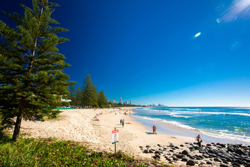 GOLD COAST, AUS - JULY 8 2018: Gold Coast skyline and surfing beach at Burleigh Heads, Australia