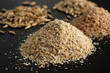 Bran oatmeal with a large grind, with grains of oats and wheat on a black background. Useful, cleansing, for a healthy diet