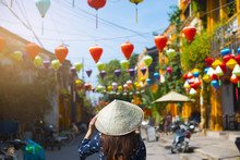 Tourist Is Walking In Old Town In Hoi An, Vietnam.