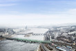 Seoul cityscape, skyline, high rise office buildings in Seoul city, winter daylight Crack on an ice surface of frozen Han river top view in winter, Seoul, Republic of Korea, in fog winter