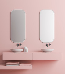 Double sink, pink wall close up