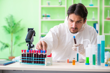 Chemist working in the lab on new experiment