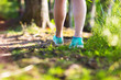 Young woman run in summer the forest in sunset lights