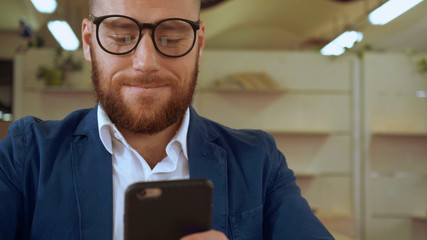 Poster - caucasian bearded guy use mobile