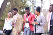 © alfa27 - a charming african students are walking outsides. free time