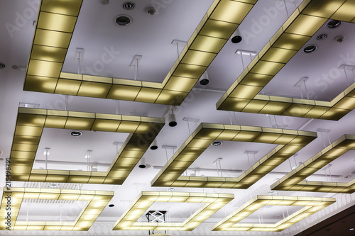 View Of A Suspended Futuristic Ceiling With Modern Lighting