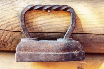 old iron on the wall in the old house