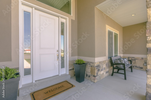 Fotografie, Obraz White front door with welcome mat on patio