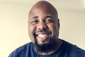 Portrait of cheerful black man