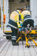 © Kzenon - Paramedic on stretcher fighting for life of injured woman giving cardiac massage