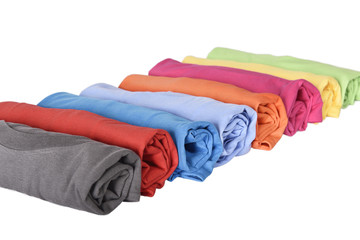 Wall Mural - Row of rolled t-shirts with multi colored