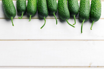 Cucumber on wooden background