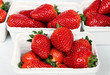 Freshly harvested strawberries in at market.