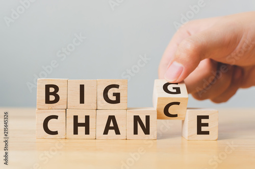 Hand flip wooden cube with word change to chance, Personal development and caree Poster Mural XXL