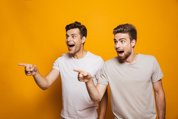 Canvas Print - Portrait of a two happy young men best friends