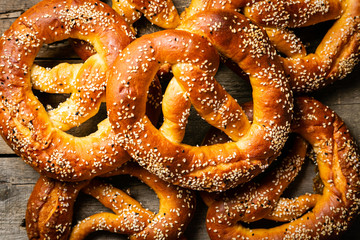 Poster - Oktoberfest concept - pretzels on rustic wood background