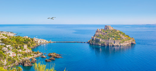 Wall Mural - Panoramic view of Ischia Island and Aragonese Castle, Italy