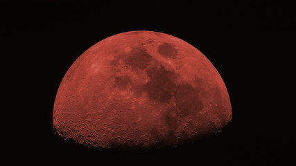 red moon in the black sky.