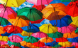 Leinwandbild Motiv Lots of colorful umbrellas in the sky. City decoration