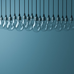 Poster - Hanging incandescent light bulbs on dark green background for decoration 3D rendering
