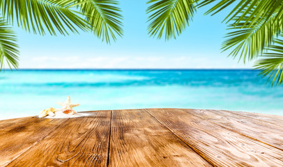 Desk of free space and summer beach 