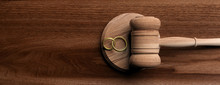 Wedding Rings And Judge Gavel On Wooden Background, Banner, Copy Space. 3d Illustration