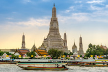 Longtail Boats On The Chao Phraya River At The Temple Of Dawn, Wat Arun, Bangkok