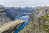 Fototapeta  - Trolltunga rock formation is one of the most popular and scenic places in Norway