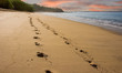 Footsteps on Early Morning Beach