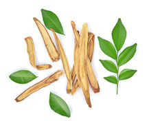 Top View Of Slice Licorice Roots On White Background