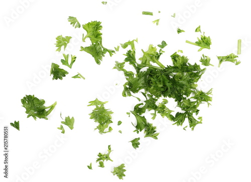Fotomural Fresh green chopped parsley leaves isolated on white background