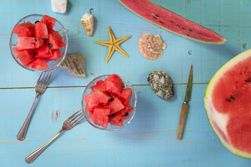 Two glass bowls with chopped watermelon. Summer concept