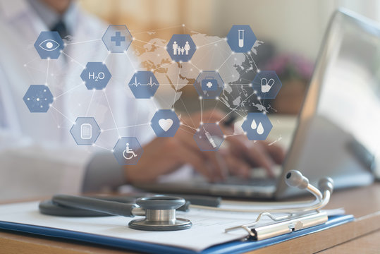 Doctor working on laptop computer