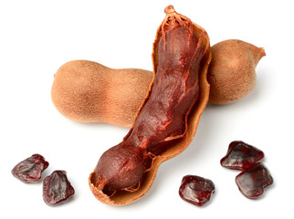 fresh tamarind fruits isolated on the white background