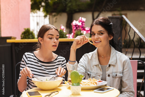 Feeling Jealous Dark Haired Woman Eating Green Garden Salad