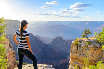 Wall Mural - Hiker in amazing Landscape scenery of South Rim of Grand Canyon National Park, Arizona, United States