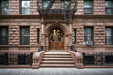 Steps Leading Up To A Brownstone Building