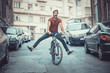 © Teodor Lazarev - Young man lost control over his bicycle wheel, sliding downhill afraid and scared
