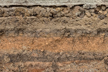 Background Section Of The Soil Beneath The Gravel Road.