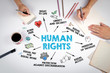 human rights Concept. Chart with keywords and icons. The meeting at the white office table