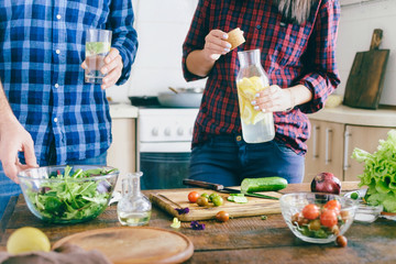 Couple cooking healthy simple food home kitchen Healthy food concept Couple preparing summer salad