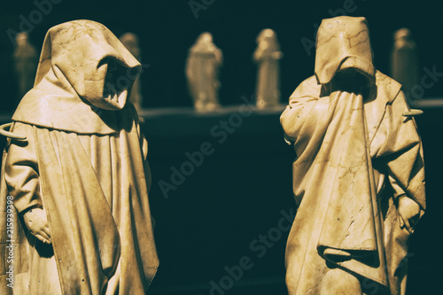 Cuadros en Lienzo Mysterious friar monks white marble statues.