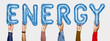 © Rawpixel.com - Hands showing energy balloons word