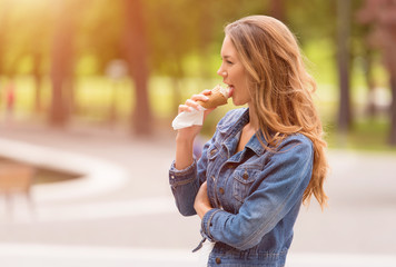 Wall Mural - Beauty girl eating ice cream