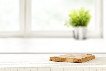 Wall Mural - desk of free space and window background with small plant