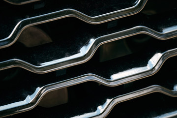 Radiator grille. Metal close-up texture background