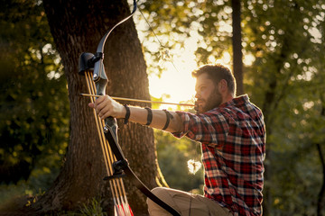 Young archer training with the bow