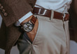 © ClaudiK - Vintage smart casual outfit outdoor.Fashion model man posing in office.Suited man posing.closeup fashion image of luxury watch on wrist of man.body detail of a business man.Not isolated.
